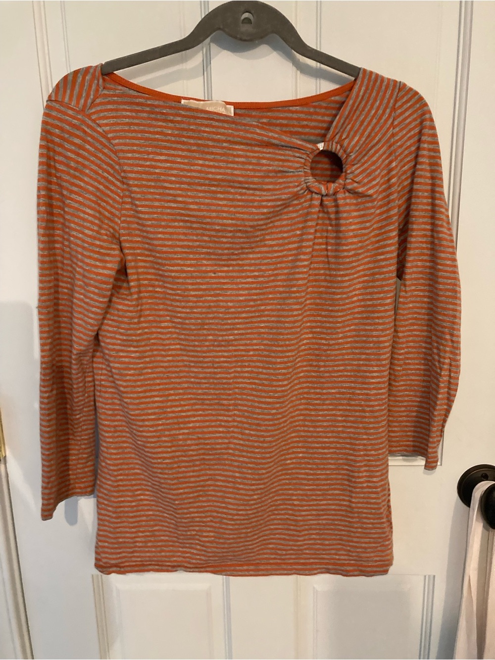 Striped Orange Crewneck Top with Ring Detail